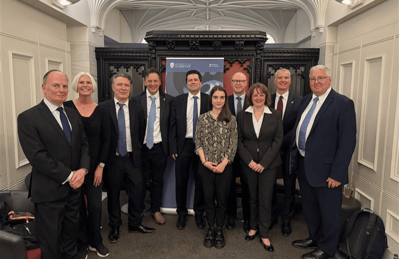 A group of staff and partners at an event in Parliment