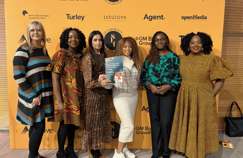 Researchers from the University promoting the race representation and culture change report at an event