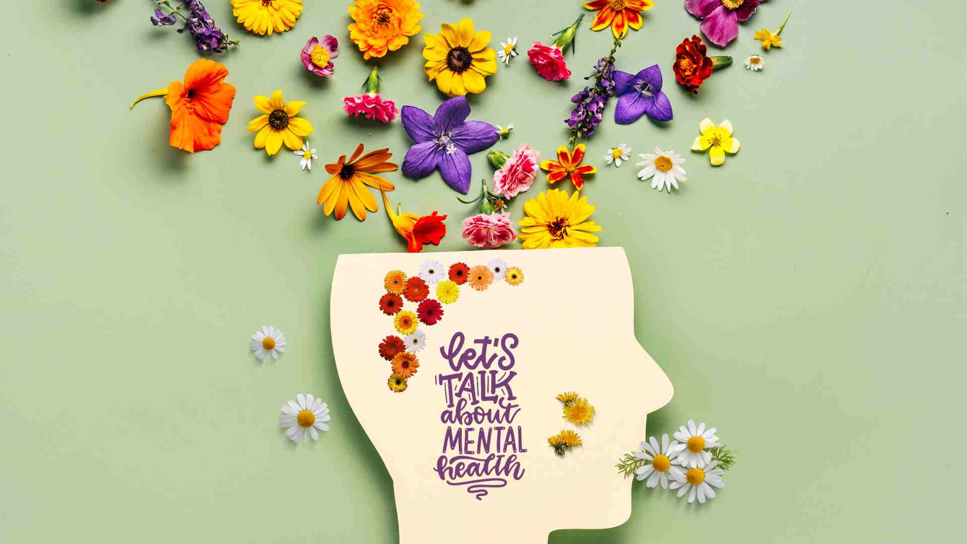 A graphic of a human head with flowers coming from the top with some text saying 'Let's talk about mental health'