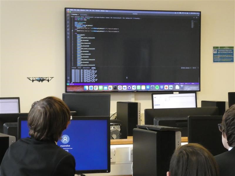 Child at computer at cs outreach event