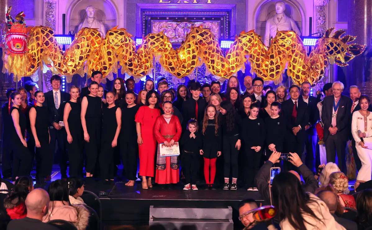 Group photograph of Chinese New Year Gala performers with VIPs