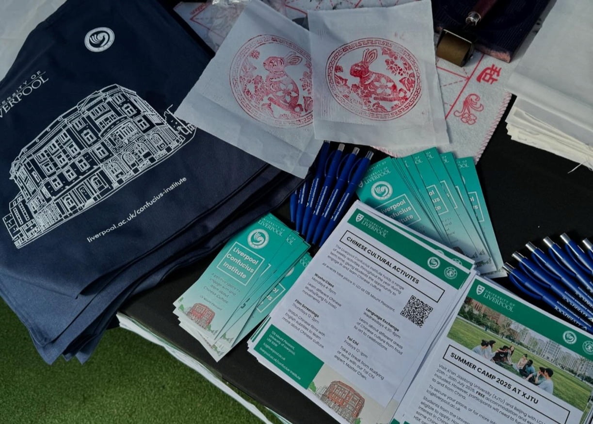 LCI Welcome Week stall with tote bags and flyers.