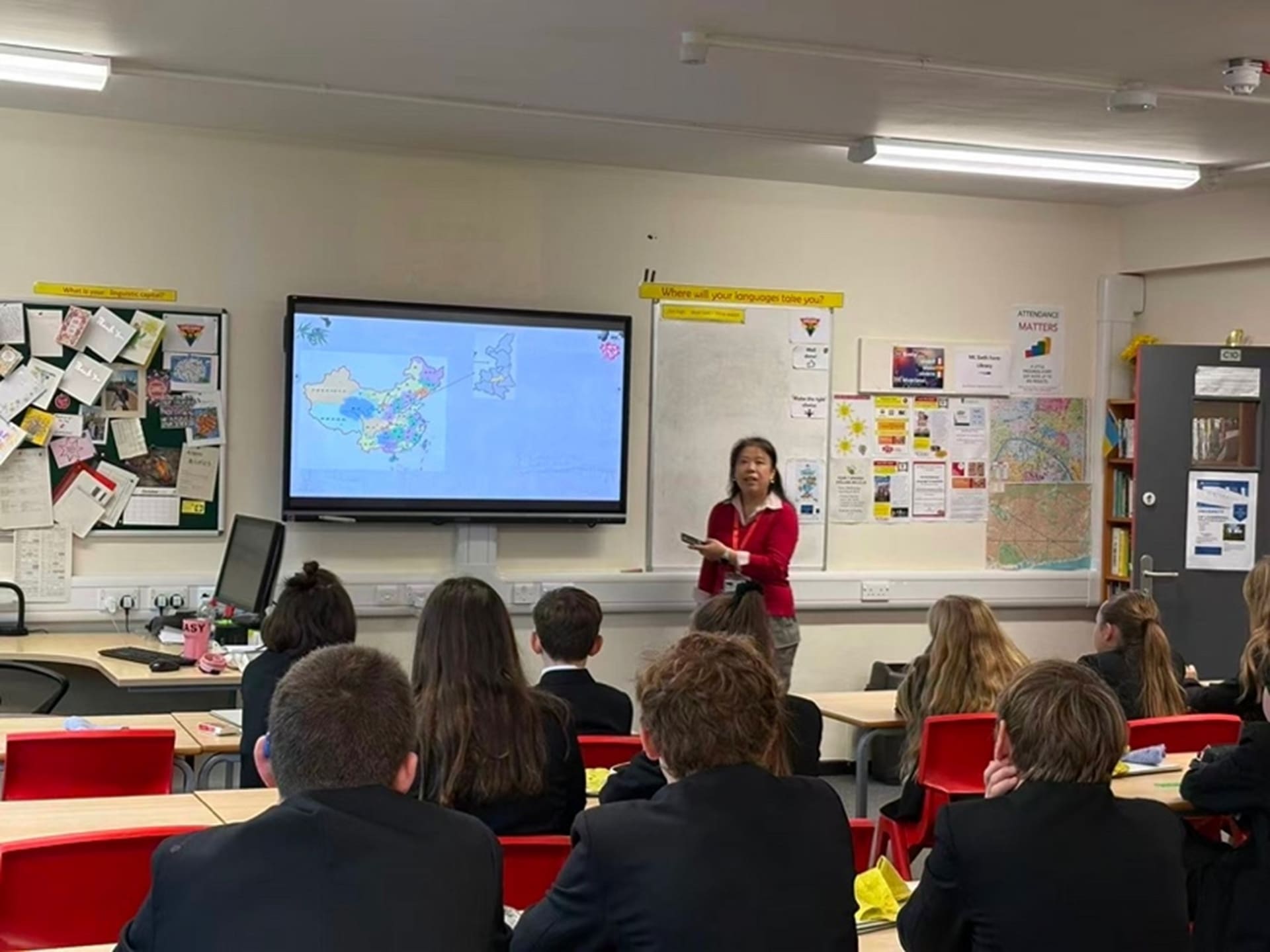 LCI staff member teaching in a classroom.