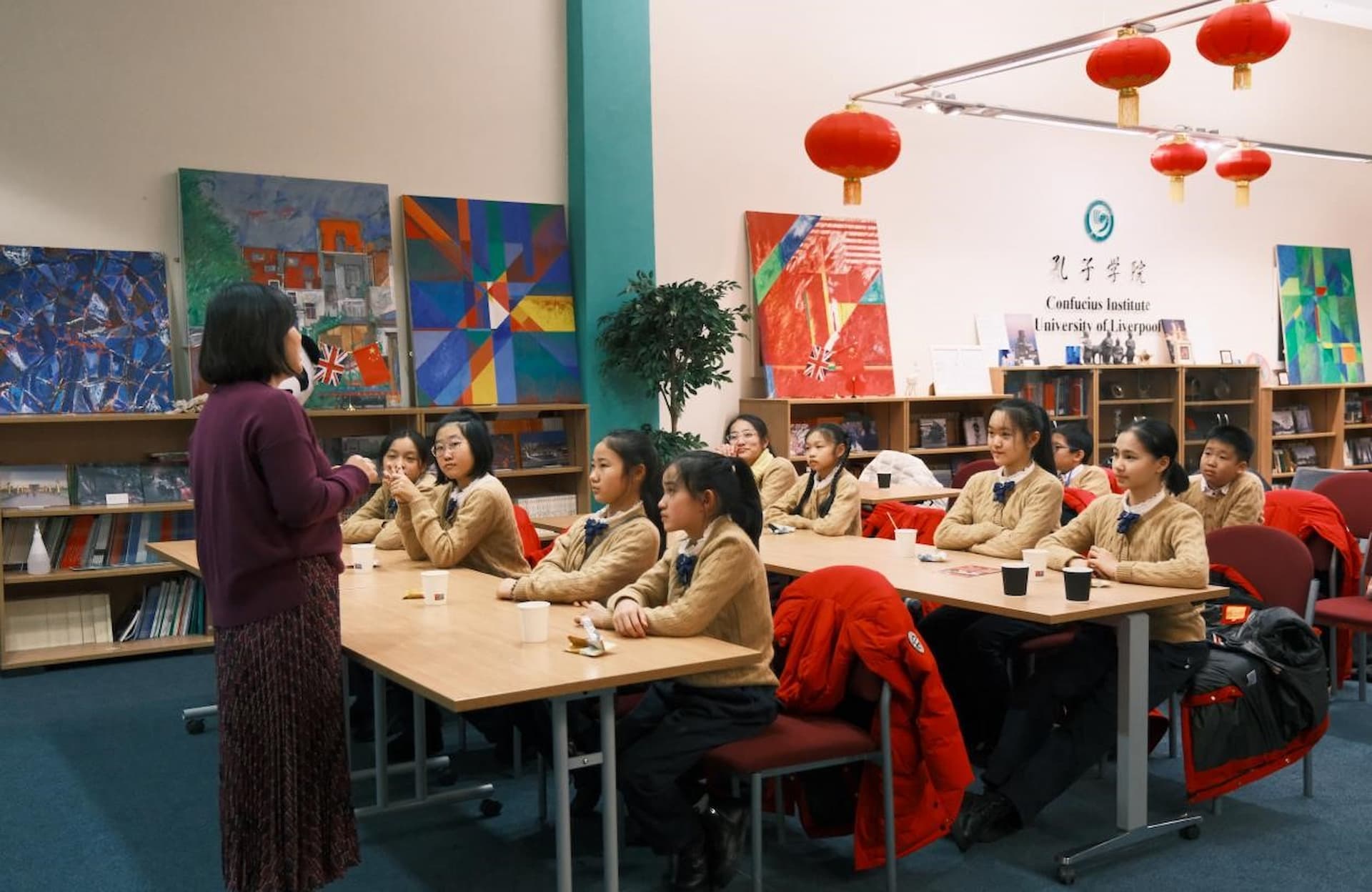 Shanghai's China Welfare Institute Youth Palace students listening to Dr Penny Ding in the LCI space