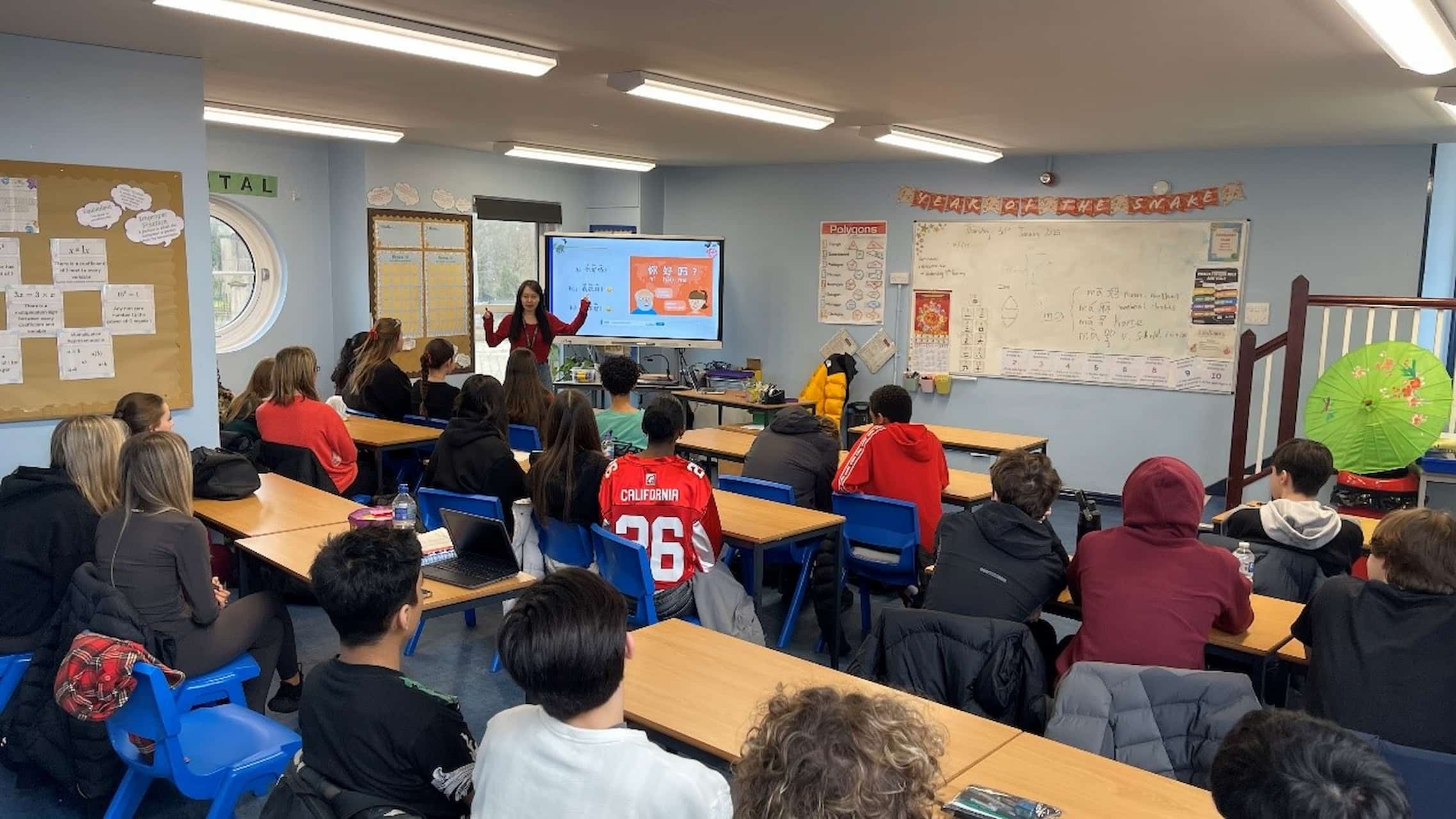 LCI tutor teaching mandarin in a classroom