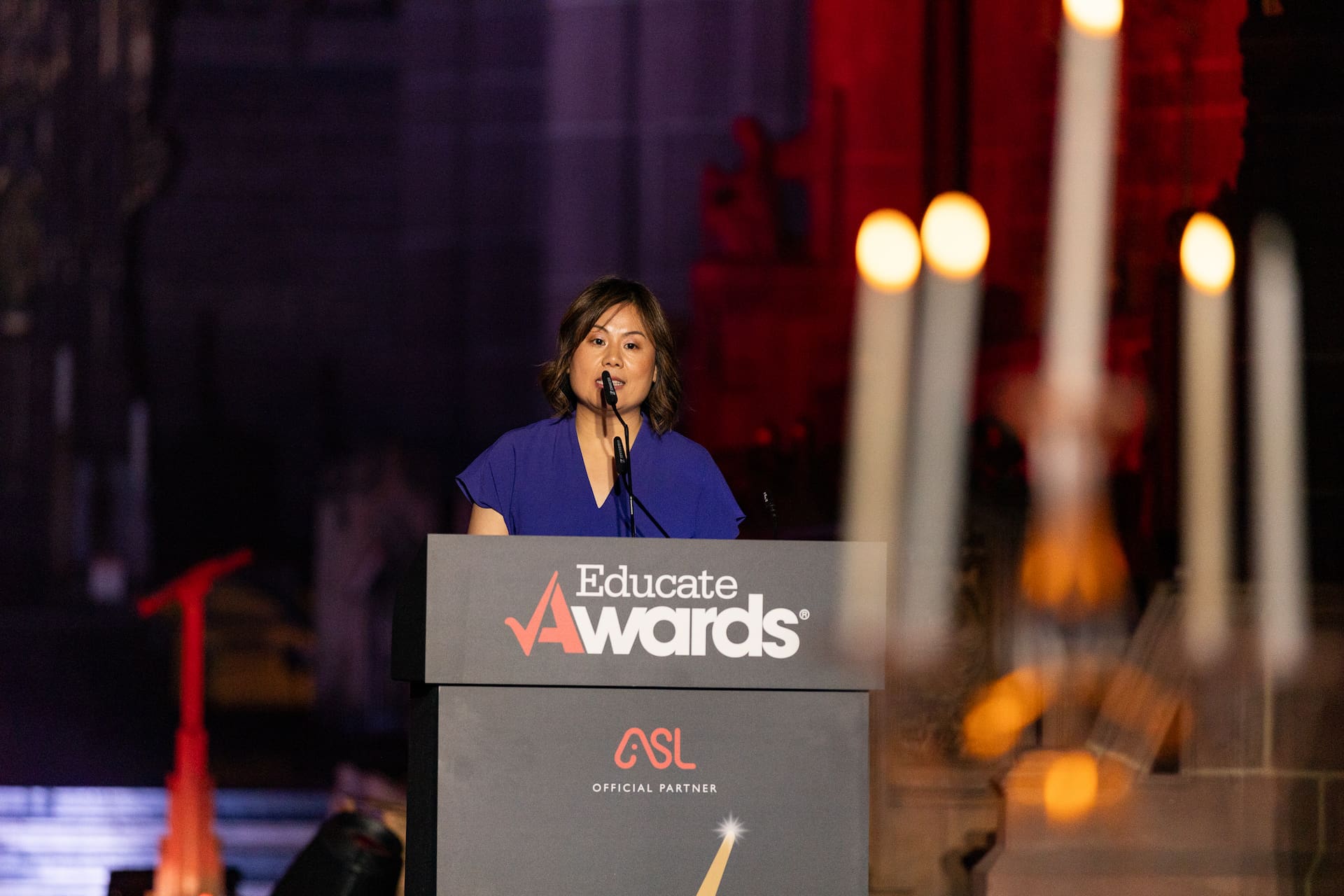 Dr Penny Ding presenting an award at Educate Awards 2025