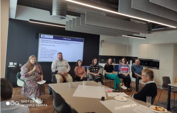 A panel of people discussing public engagement