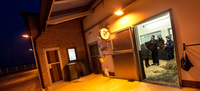 View inside an ICU stable from outside the building at night