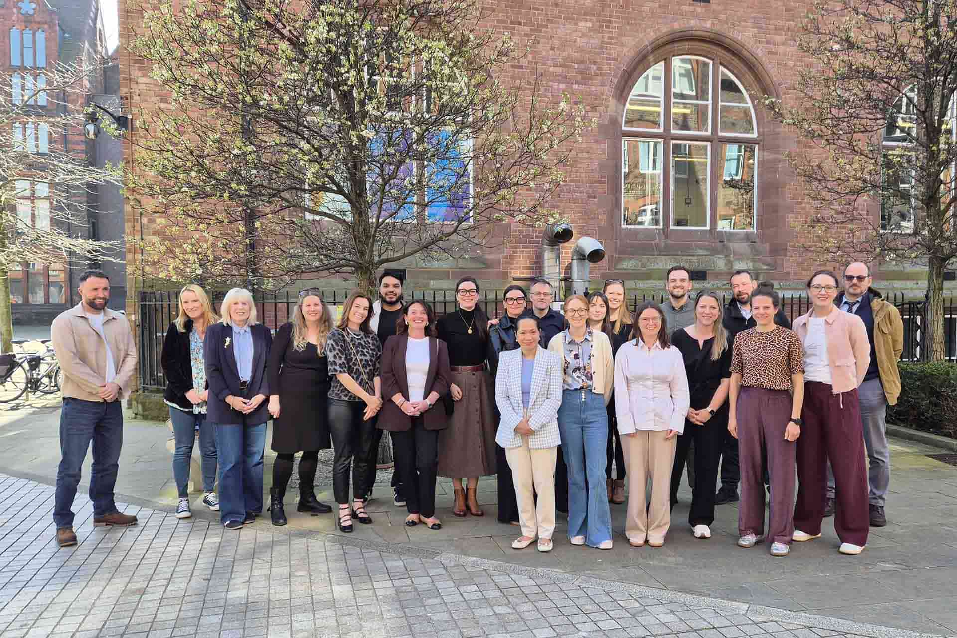 Clarissa Giebel and colleagues pose outside the thompson yates building fo a group photo