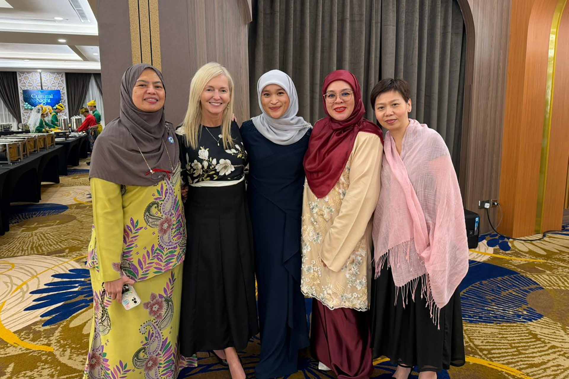 Professor Fiona Rowe at Brunei Ophthalmology Conference with three colleagues