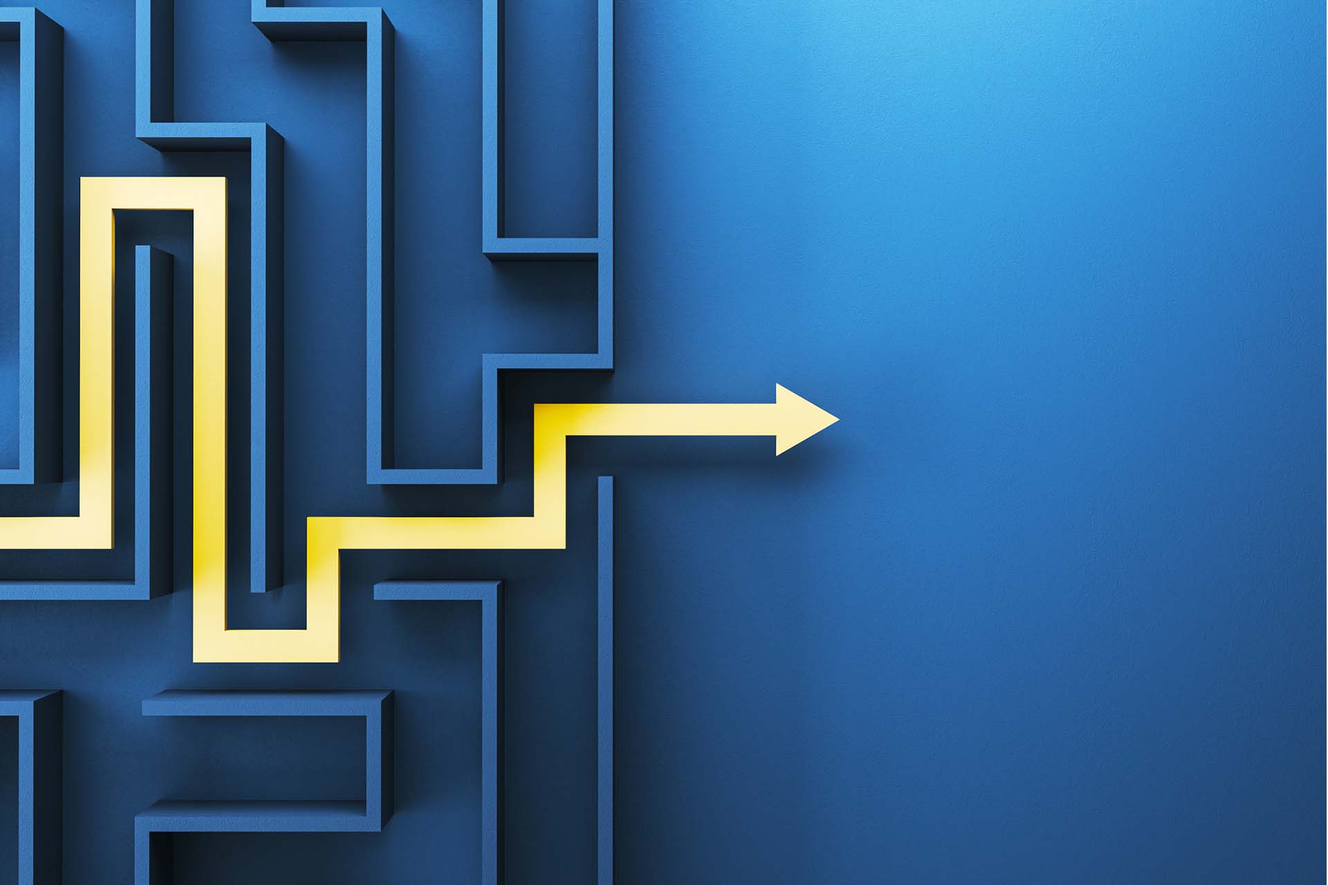 image of a maze from above with the path out indicated by a yellow arrow