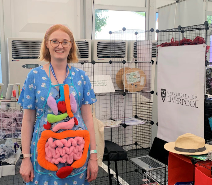 A volunteer demonstrating the 'body apron'