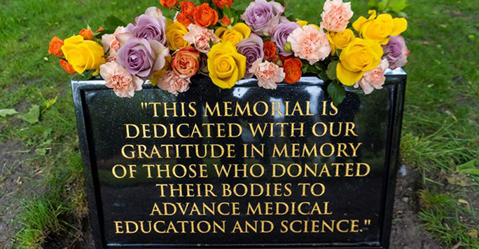 Memorial plaque and flowers