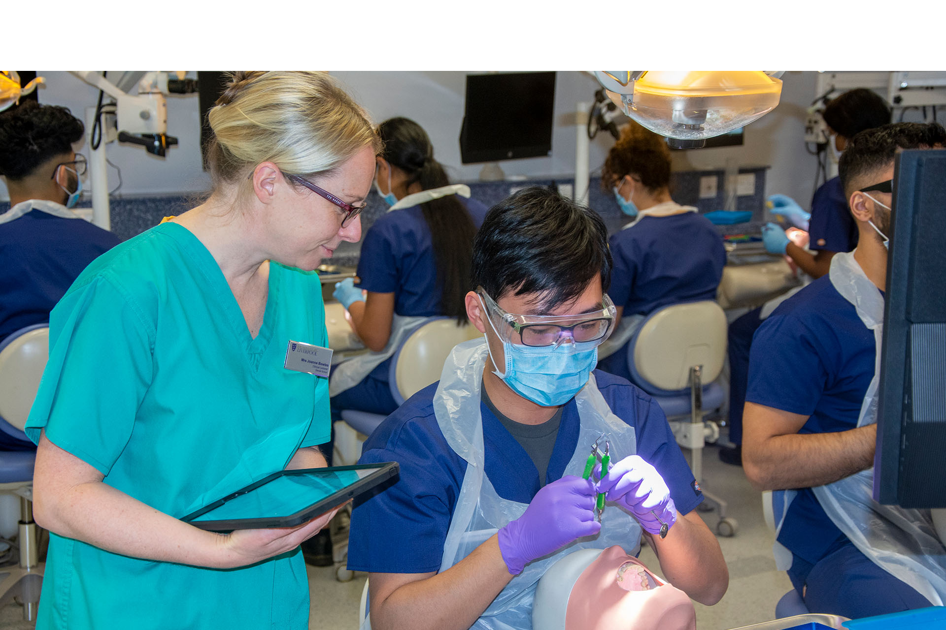 Dentistry students working on phantom heads