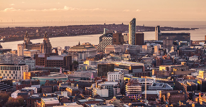 Aerial shot of Liverpool city centre and the River Mersey