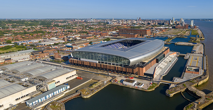 Aerial photograph of football stadium and adjacent docks