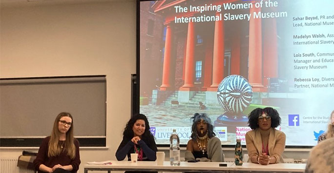 A panel discussion image of women