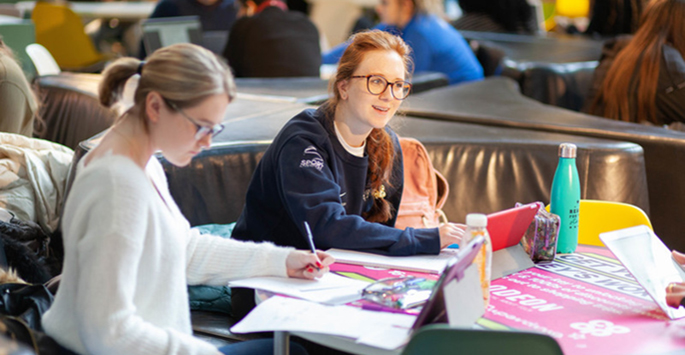 Students updating notebooks 