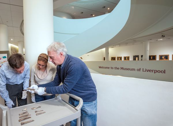 Students studying objects at Museum of Liverpool