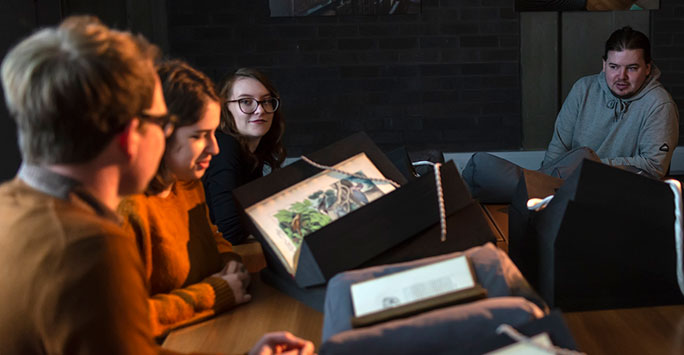 Students studying in archives 