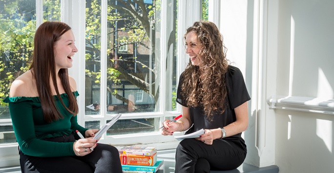 Lecturer and student in conversation