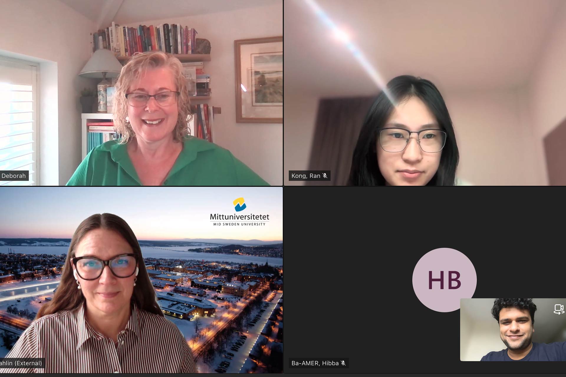 A screenshot of 4 people accessing remotely on videocamera attending an online webinar.