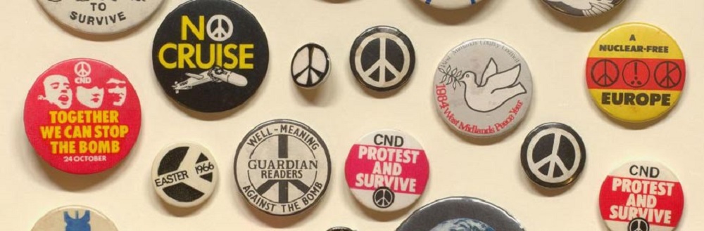 A display of historical political badges and peace-sign badges