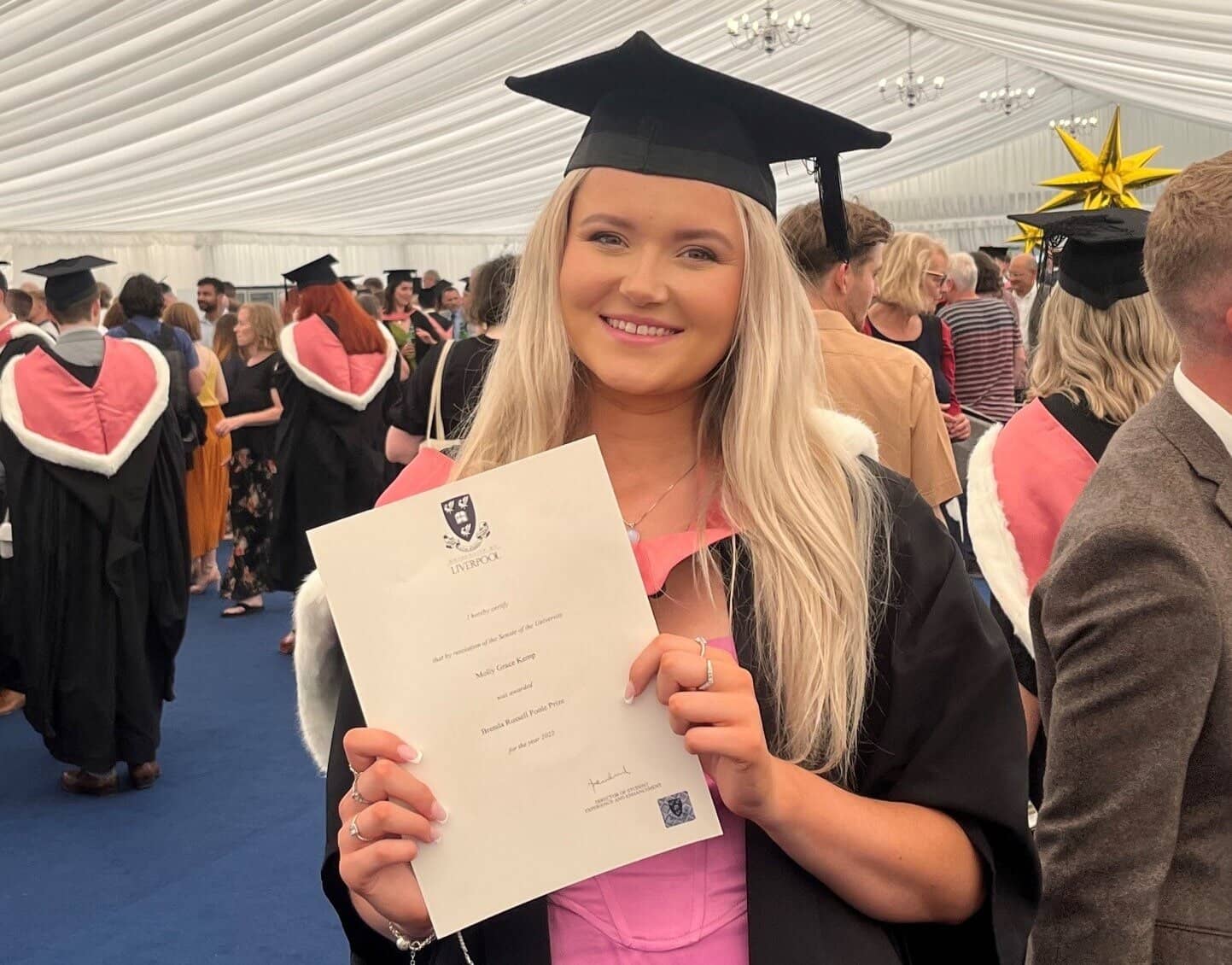 History graduate with prizegiving award