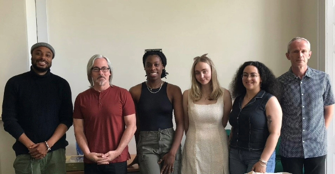 Stephen Kenny and MA International Slavery Students – Kwame Amoah-Boateng, Taylar Charles, Emma-Leigh McCabe and Aisha Taylor Duran met with Professor Stephen Berry (Gregory Professor of the Civil War Era, Department of History, University of Georgia)standing in a line smiling and facing the camera