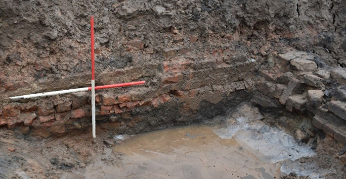 Brick wall foundations of West Derby Stone Bridge Farm