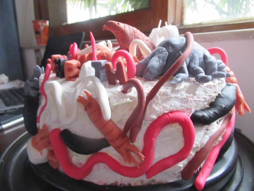 A cake with shrimp decorations