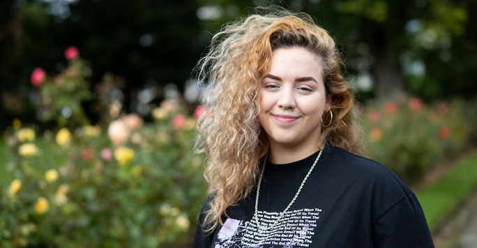 Student in gardens on campus