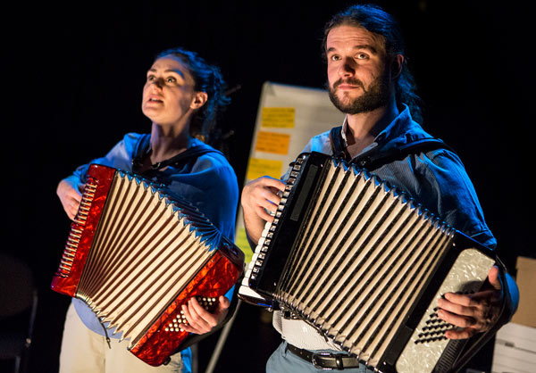 Actors playing accordian