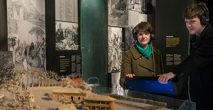 Students reviewing exhibition at the International Slavery Museum.