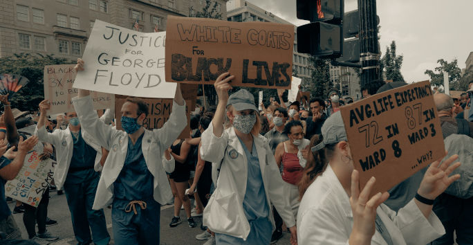 Doctors and nurses march at the Black Lives Matter protest in Washington, DC, 6 June 2020 by Clay Banks via Unsplash