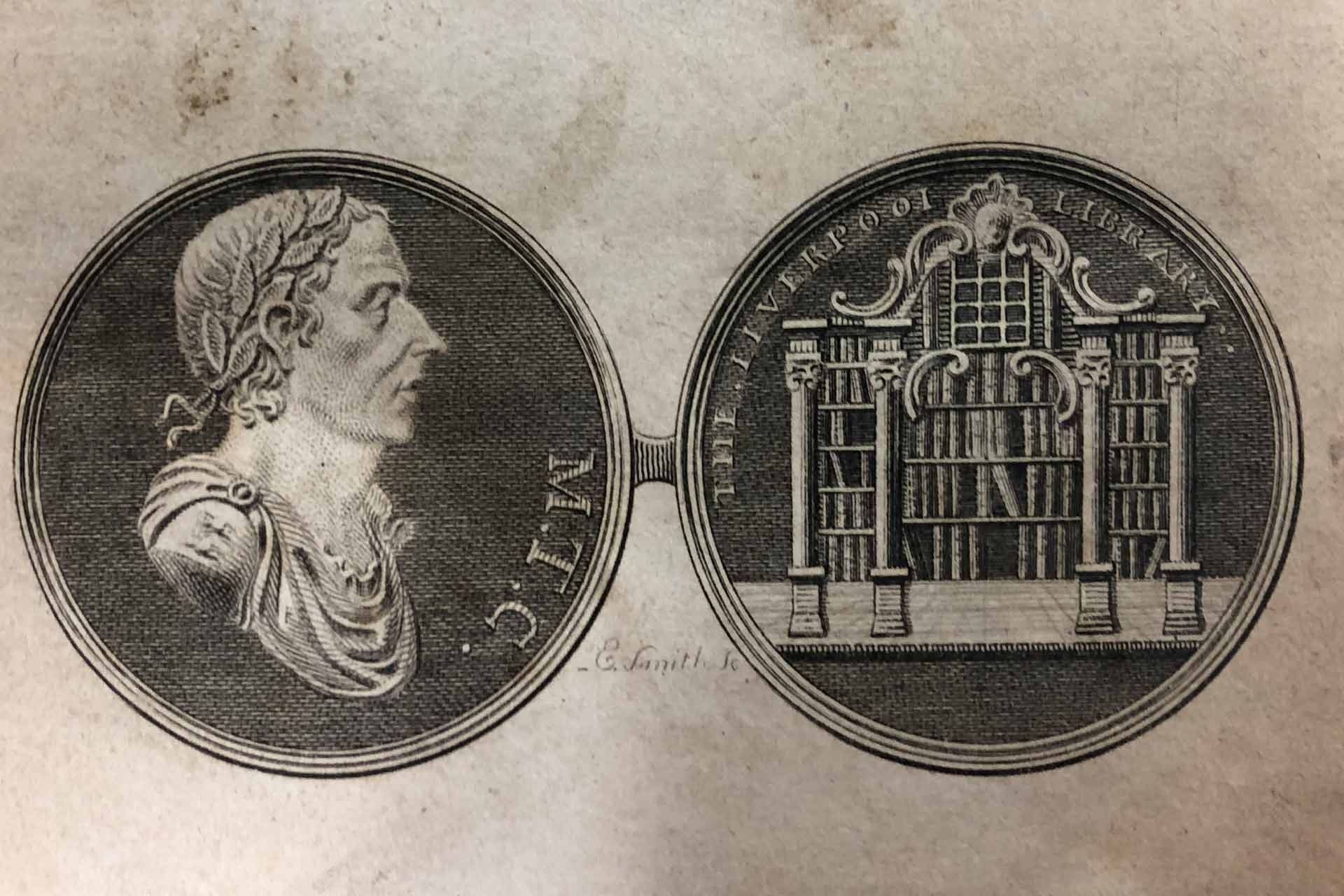 A black and white print, on the left is a head of a man inside a circle and on the right is a library with the words 'The Liverpool Library' also inside a circle.