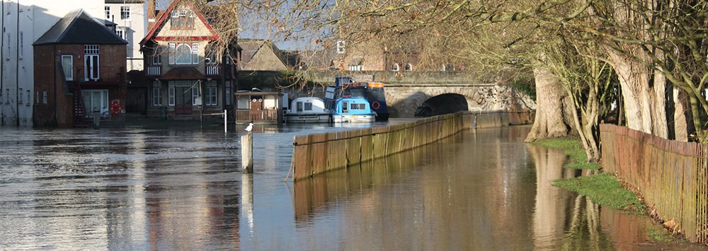 street scene in oxford with flooding in a residential area