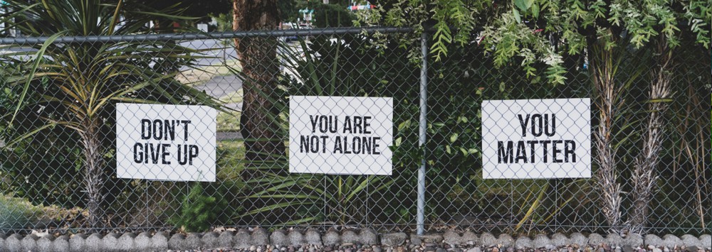 Signs displaying supportive messages