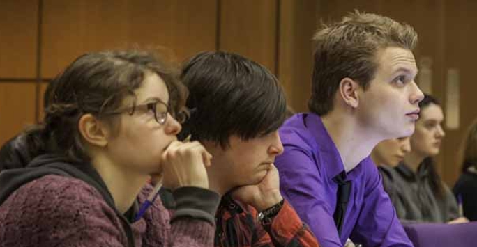 Students listening in a lecture hall