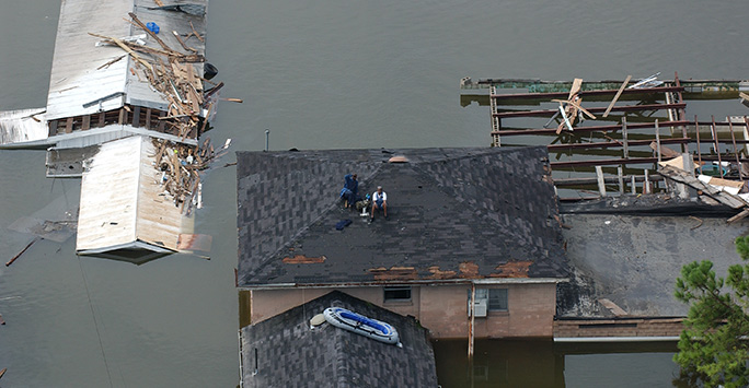 Rooftops emerging from flood waters