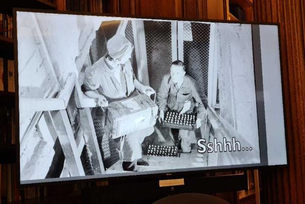 A still from a wartime propaganda film urging secrecy