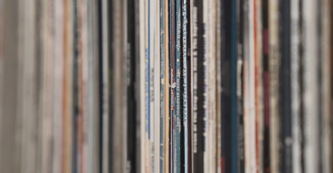 Record sleeves on a shelf