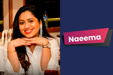 A student with her hands folded