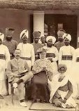 Colonial-era photograph of white army officers and Indian men in uniform