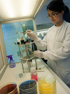 Female in a white lab coat 