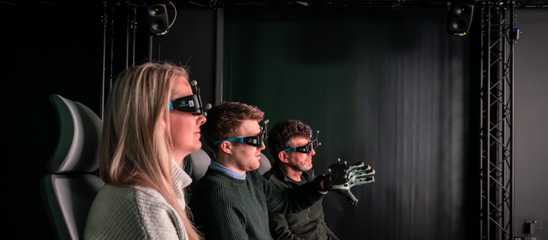 Group of people in virtual reality headsets