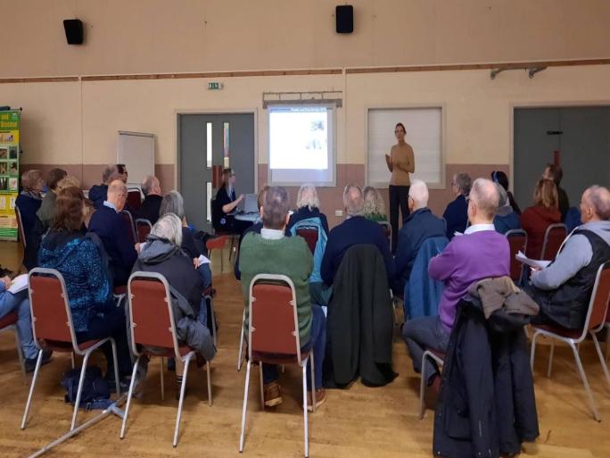 Dr Caroline Millins presenting research findings at a community meeting in Balivannach Hall, Benbecula, Outer Hebrides, 22 February 2023