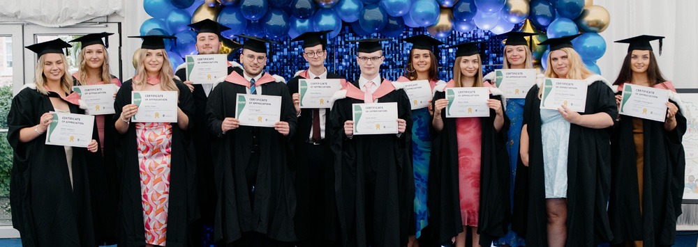 Group of Interchange students at graduation