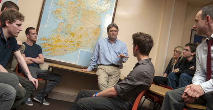 Image of students with a lecturer during a seminar