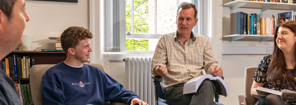 Professor Frank Shovlin with students in his office